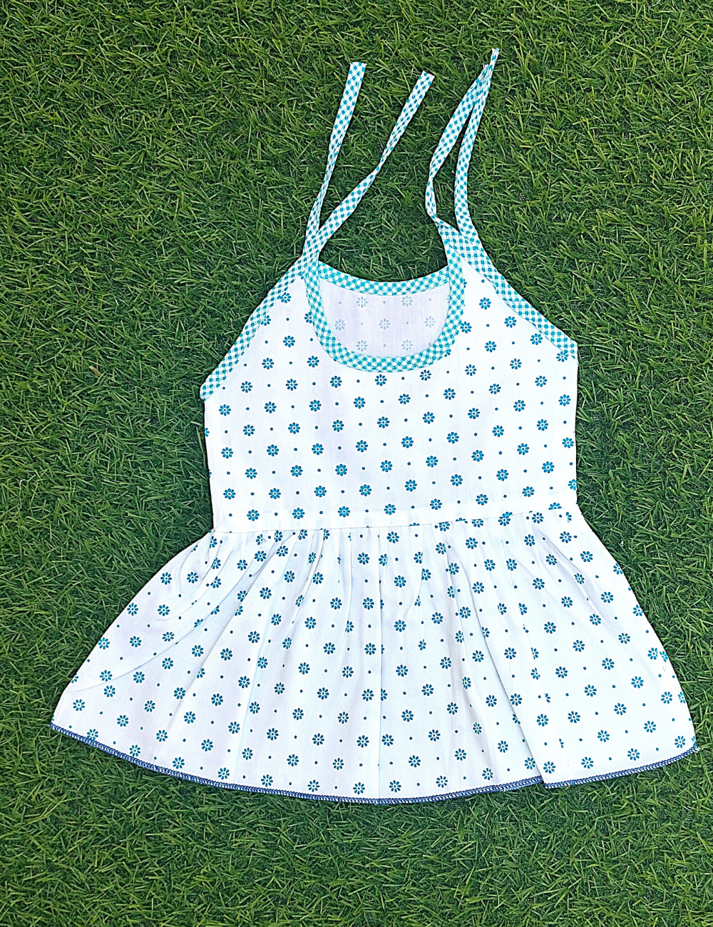 PURE COTTON, PURE CUTENESS – ADORABLE WHITE BASE KNOT FROCKS